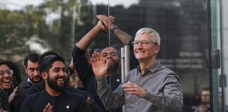 Dow jumps 200, Apple hits record, Boeing higher