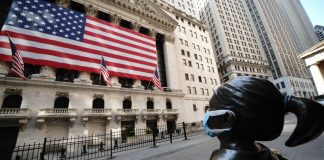 Stock futures flat after Monday's rally on hopes for economy reopening