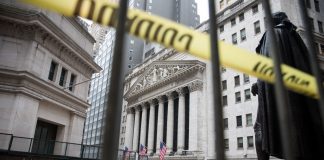 Dow futures drop 100 points as Wall Street braces for more tech losses