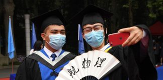As China's economy picks up, new university grads are still looking for jobs