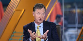 Fed's Evans disappointed by Mnuchin's move to stop some funding